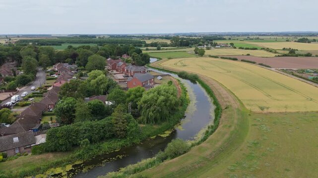 Aerial view shows a river winding through countryside