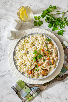 Blanquette de poulet with wild mushrooms and rice