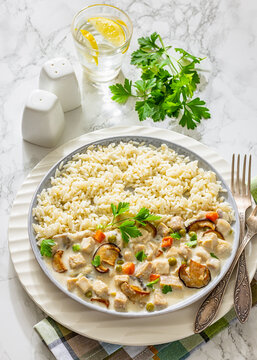 Chicken fricassee with wild mushrooms and rice