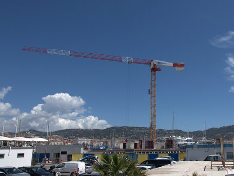Tower Crane Operating at Coastal Harbor Construction Site