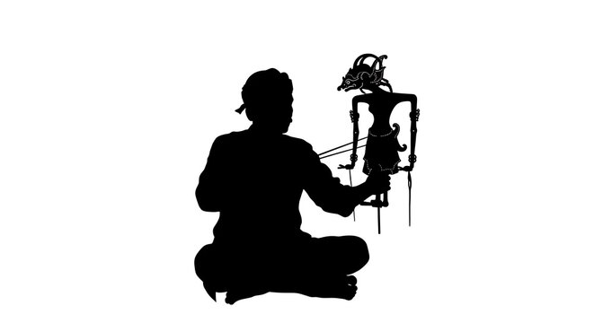 Indonesian puppeteer silhouette performing wayang shadow puppet show