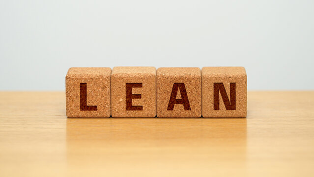 LEAN on four cork wooden blocks - lean management concept
