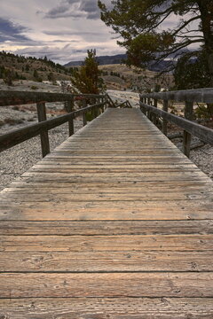 Lower Terraces Trail in Mammoth Hot Springs series of wood boardwalks; straight tract pointing right to the concession area. Yellowstone NP-WY-USA-021