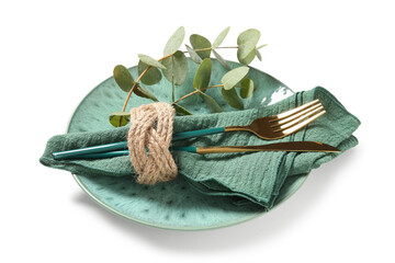 Table setting and hospitality, green ceramic plate with gold cutlery and eucalyptus branch for luxury dining and restaurant interior design © Pixel-Shot