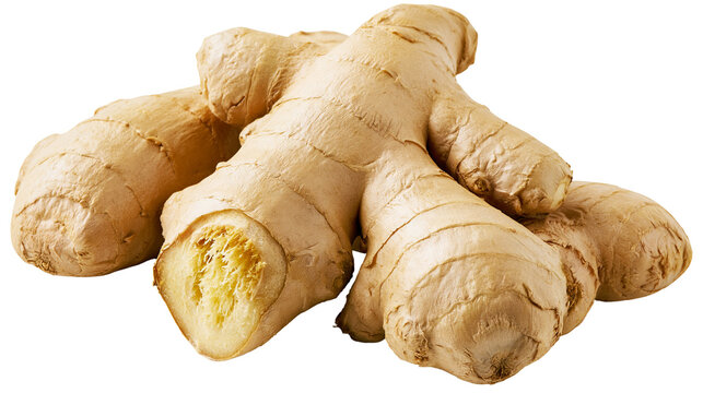 Isolated fresh ginger root pieces, one sliced open to reveal the fragrant golden interior