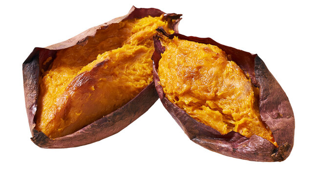 Isolated hot baked sweet potatoes split open showing delicious healthy orange flesh