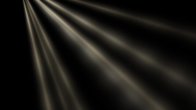 Volumetric warm light rays shining downward diagonally from top left corner against black background seamless loop animation