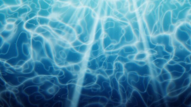 Beautiful underwater caustics light patterns dancing on the deep blue ocean floor with floating particles