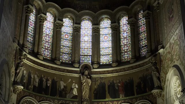 
Barcelona, Spain, 5 May 2026. Interior view of the Church of the Sacred Heart of Jesus on Carrer de Casp, with colorful stained glass windows, decorative arches, and elaborate religious details.