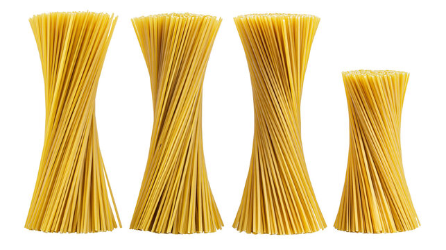 Isolated raw dry spaghetti pasta bundles standing upright, ready for cooking a delicious meal