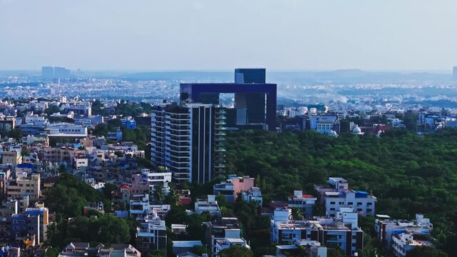 independent houses with one hyd park ultra luxury apartments, KBR park and City Police Commissionerate Twin towers at banjara hills, hyderabad, telangana, india. day time, push in shot, drone shot, 4k