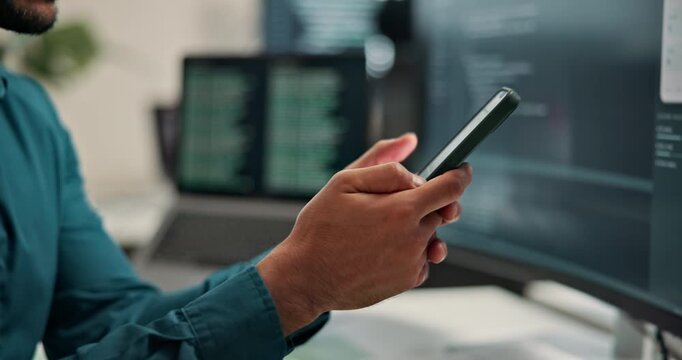 Programmer, texting and hands with phone in office, software development and typing message on web. Programming, online and person with technology, coder and communication with contact on mobile app