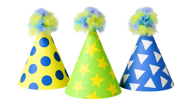 Isolated three vibrant party hats with colorful fluffy pom-poms for birthday celebrations.