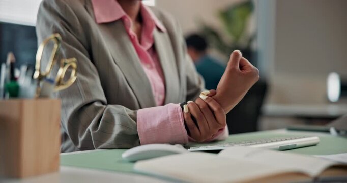 Hands, woman and wrist pain in office with computer, typing and carpal tunnel from programming. Person, discomfort and tech in workplace with muscle stiffness, employee injury and burnout from coding