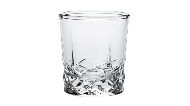 Isolated empty clear crystal faceted whiskey glass tumbler for cocktails and spirits