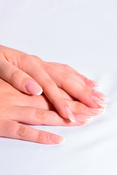Female hands with French manicure in side perspective view