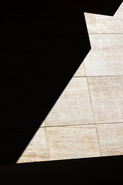 Minimalist Geometric Architectural Details of Rough Stone Walls with Deep Shadows. Close-up
