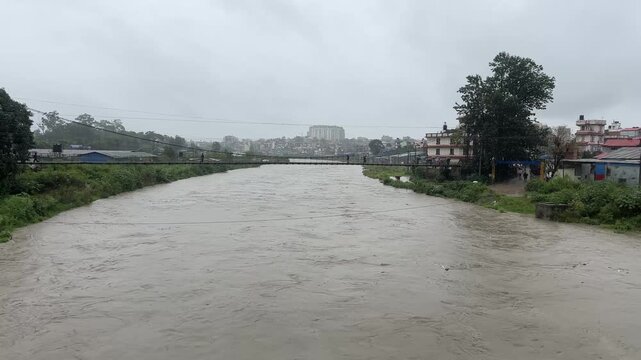 The water level in the Bagmati River rises amid heavy rainfall in Kathmandu, Nepal. The rainfall has disrupted daily activities as a deep depression over the Bay of Bengal continues to influence weat