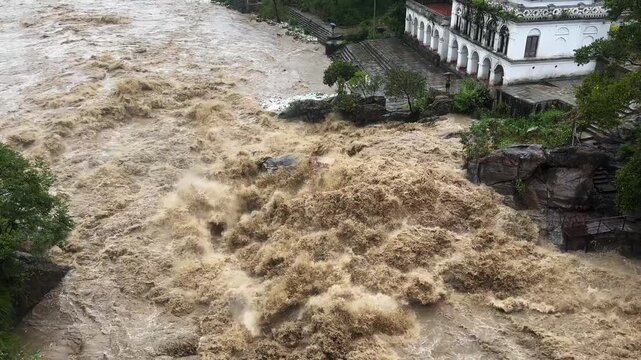 The water level in the Bagmati River rises amid heavy rainfall in Kathmandu, Nepal. The rainfall has disrupted daily activities as a deep depression over the Bay of Bengal continues to influence weat