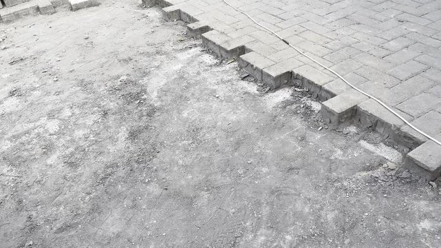 Unfinished Concrete Paving Blocks Installation Work in Progress