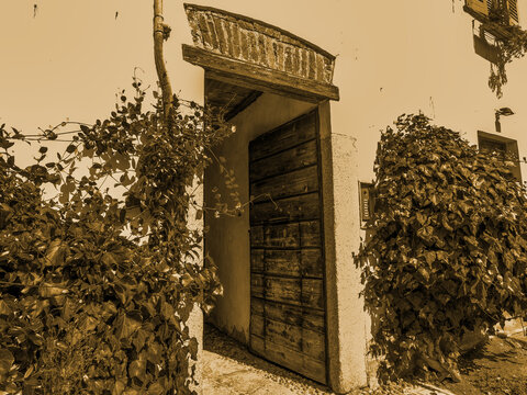 Old wooden door with stone archway historic architecture exploration