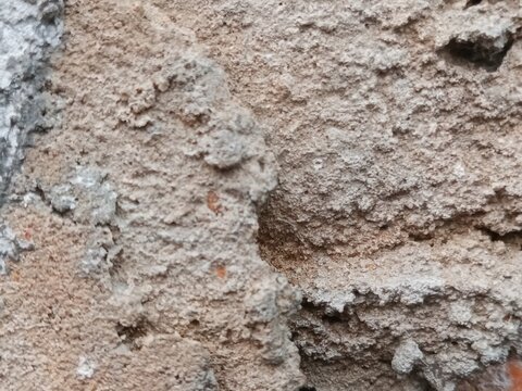 cast wall relief with uneven installation, rendering and 3D background material, grunge wallpaper