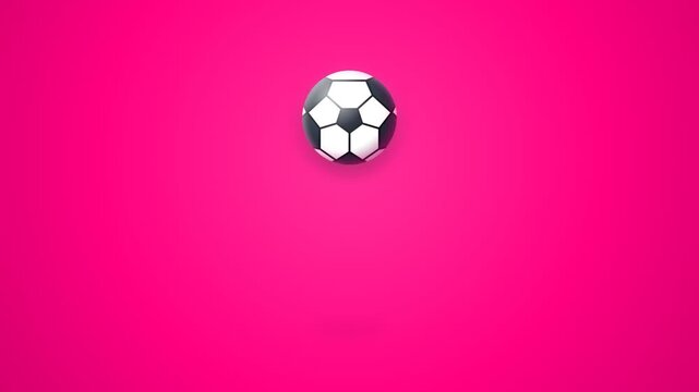 A soccer ball bouncing on a bright pink background