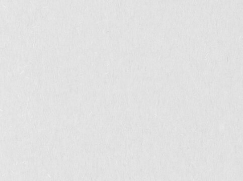 Blank drawing paper with a compact white grain and faint lengthwise fibers offers a pressed surface for pencil sketches, a matte paper texture for sketchbook pages and stationery backgrounds