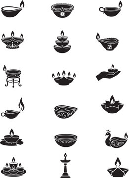 Diya lamps arranged for diwali celebration with traditional oil lamps and decorative patterns