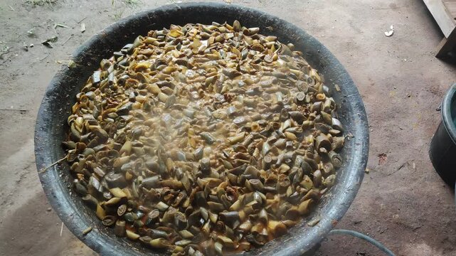 Traditional Kedah Beef And Banana Stem Curry Cooking In Large Wok.