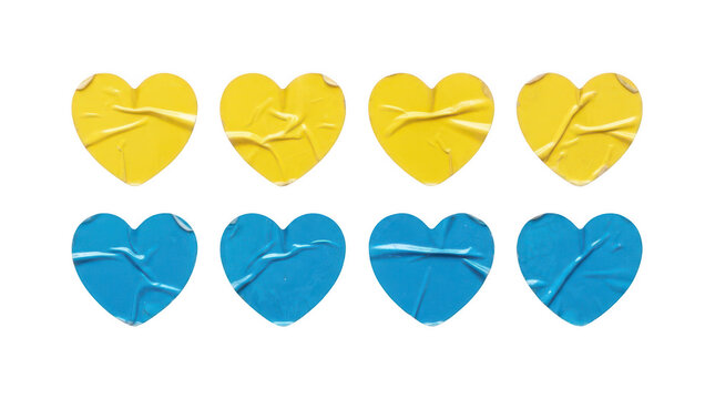 Eight wrinkled heartshaped stickers in yellow and blue colors isolated on transparent background
