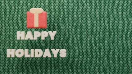 Happy holidays white felt letters gift green knitted christmas festive ideal for greeting cards seasonal campaigns social media posts gift packaging flyers newsletters and festive promotions © Aurora Aesthetics