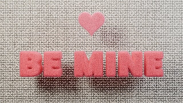Be mine pink felt letters heart beige linen closeup romantic ideal for valentine greeting cards romantic social media posts gift packaging landing pages presentations and seasonal promotions