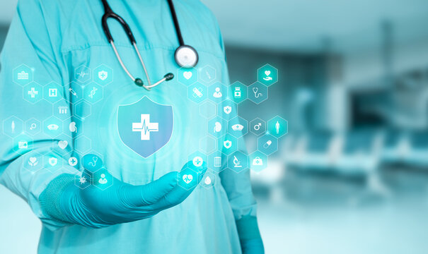 Healthcare professional managing health insurance policies on a digital screen; innovation in enrollment and modern technology for medical care