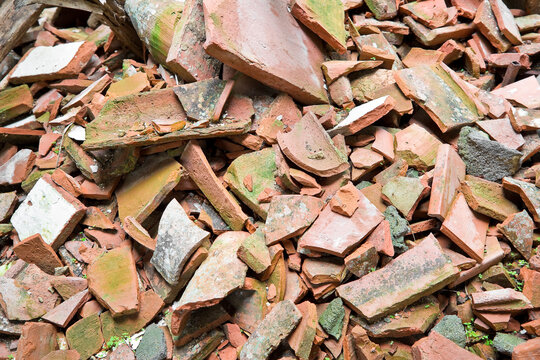 REUSABLE AND RECYCLABLE MATERIAL FROM THE CONSTRUCTION INDUSTRY - Brick rubble debris on construction site after a demolition of a brick building