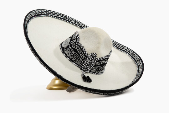 Angled High Perspective of a White and Black Mexican Mariachi hat on Stand