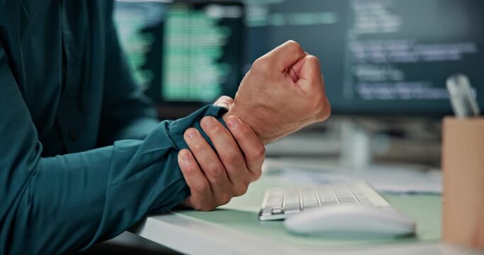 Hands, man and wrist pain in office with computer, typing and carpal tunnel from programming. Person, discomfort and pc in workplace with muscle stiffness, employee injury and burnout from coding