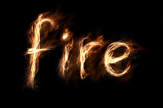Fiery lettering spells &ldquo;Night&rdquo; in glowing orange flames against a deep black background.