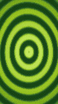 Vertical video dithered ripples spreading outward in four shades of green, seamless loop