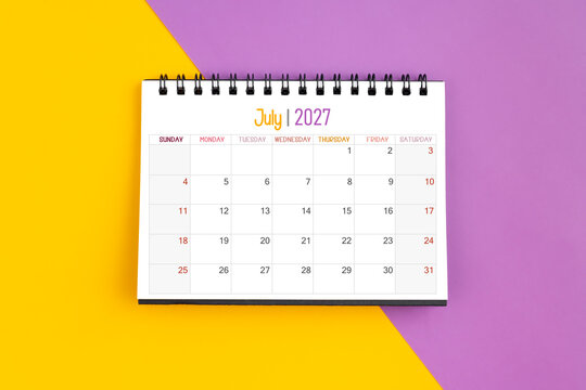 July 2027 Monthly desk calendar for 2027 year on yellow and purple color background.
