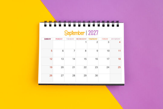 September 2027 Monthly desk calendar for 2027 year on yellow and purple color background.