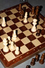 Wooden Chessboard with Chess Pieces © Blessape
