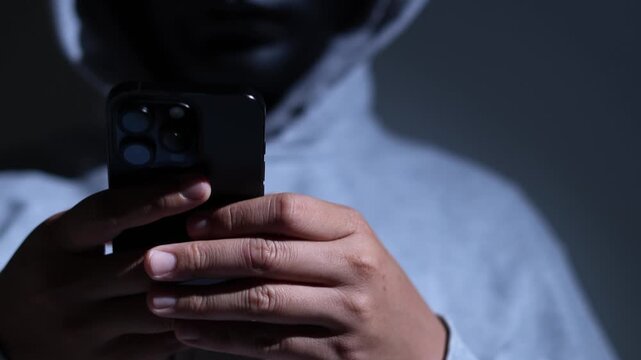 Scammers use phones and personal information to fraudulently obtain money from accounts.