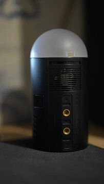 The back panel of a Godox AD100Pro pocket flash is shown in a close-up studio shot.