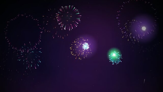 Colorful fireworks exploding in the dark purple night sky for celebration and holiday events