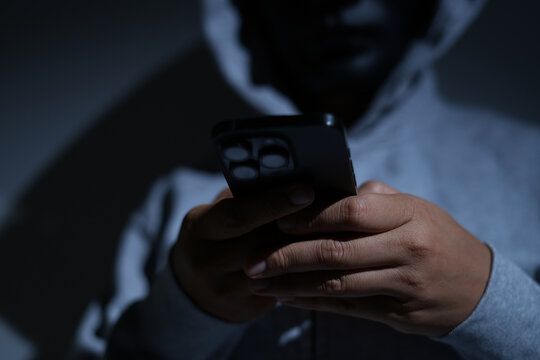 Scammers use phones and personal information to fraudulently obtain money from accounts.