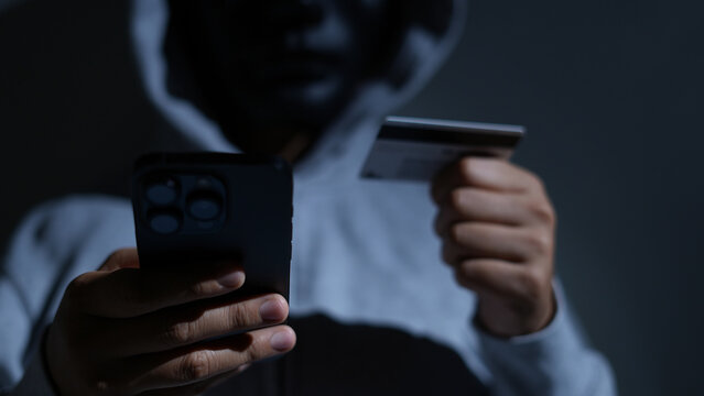 Scammers use phones and personal information to fraudulently obtain money from accounts.