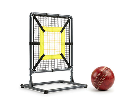 A black metal cricket rebound net with yellow target square and a red leather cricket ball placed on a clean white background, for sports training