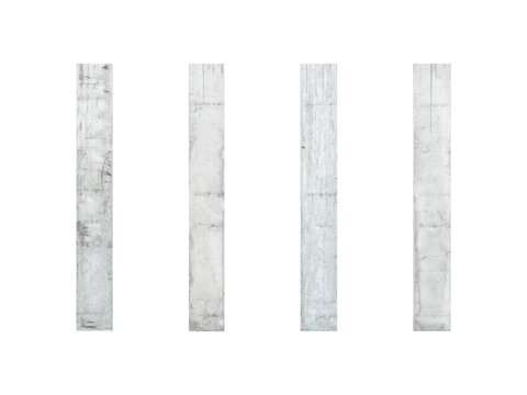 Four rectangular precast concrete columns standing vertically are isolated.