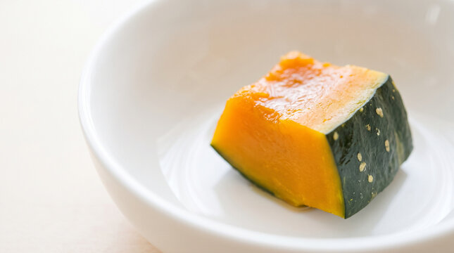 Close up of one piece of simmered Japanese kabocha squash